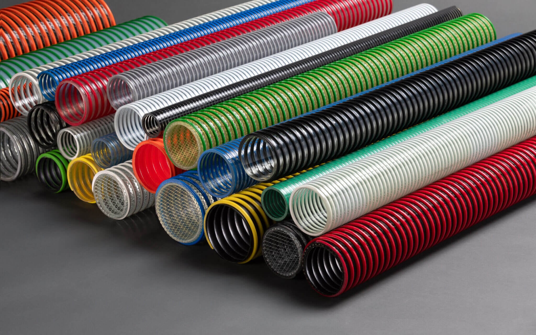 High-Quality, <b>American-Made</b> Industrial Hoses and Pipes